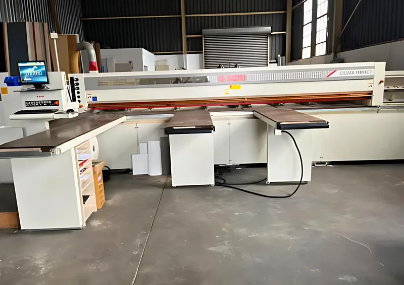 A panel being cut to size on the beam saw in the FKC Kitchens workshop in Duncanville.